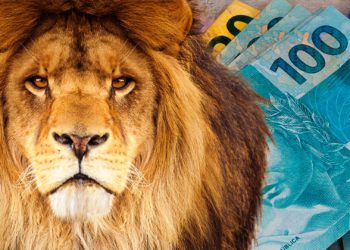 montagem com um leão e dinheiro ao fundo, representando o imposto de renda