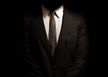vulto anônimo, mostrando apenas gravata e camisa